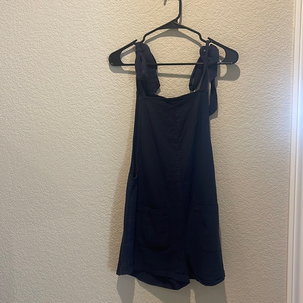Super cute romper. Size Small, a dark blue color